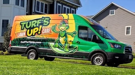 Turf's Up Lawn Care van at customer's home in Leesburg, VA.